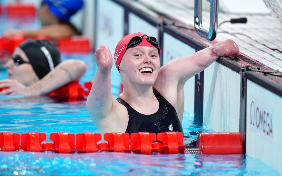 Ellie Challis celebrates winning her women's 50m backstroke S3 final