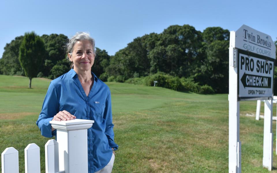 Janet Milkman, executive director of the Barnstable Land Trust beside the entrance to the Twin Brooks Golf Course in Hyannis in 2021. File photo