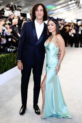 <p>Dimitrios Kambouris/Getty </p> (L-R) Cole Tucker and Vanessa Hudgens attend the 28th Screen Actors Guild Awards at Barker Hangar on February 27, 2022.