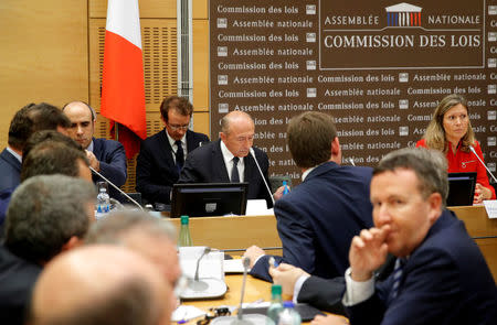 French Interior Minister Gerard Collomb (C) arrives to be questioned by lawmakers at the National Assembly about presidential aide Alexandre Benalla (not pictured) in Paris, France, July 23, 2018. REUTERS/Philippe Wojazer