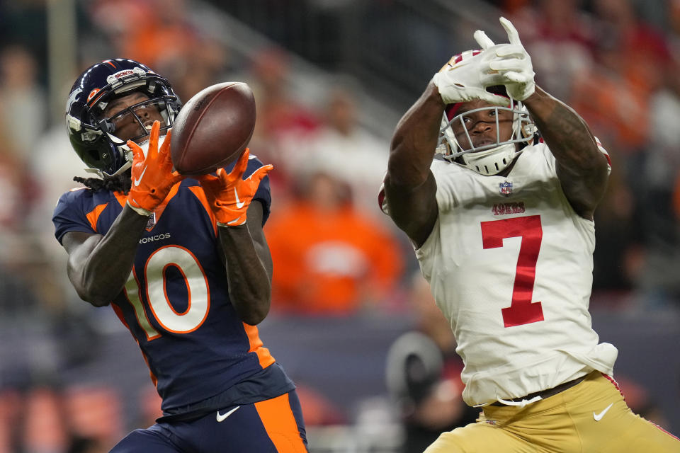 Denver Broncos wide receiver Jerry Jeudy (10) cannot catch a pass while defended by San Francisco 49ers cornerback Charvarius Ward (7) during the second half of an NFL football game in Denver, Sunday, Sept. 25, 2022. (AP Photo/Jack Dempsey)