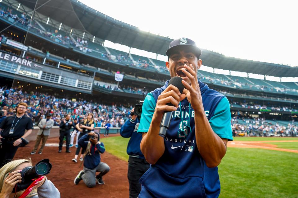 Julio Rodriguez addresses the crowd in Seattle after the regular season finale.