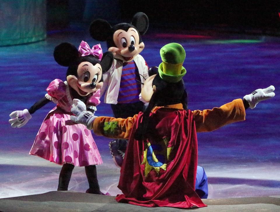 Mickey Mouse, Mini Mouse and Goofy make their entrance onto the ice Wednesday during opening night for the Disney On Ice presentation  ‘Dare to Dream’ at the El Paso County Coliseum.