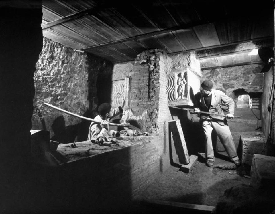 Not published in LIFE. Workmen examining underneath the floor of Basilico. (Nat Farbman—Time & Life Pictures/Getty Images) <br> <br> <a href="http://life.time.com/culture/the-vatican-unearthing-history-beneath-st-peters-1950-photos/#1" rel="nofollow noopener" target="_blank" data-ylk="slk:Click here to see the full collection at LIFE.com;elm:context_link;itc:0;sec:content-canvas" class="link ">Click here to see the full collection at LIFE.com</a>