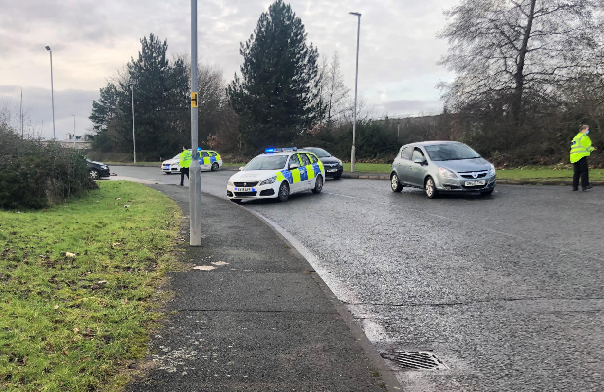 Police cordons on Abbey Road outside the Wrexham Industrial Estate near the Global pharmaceutical and biotechnology company Wockhardt site where coronavirus vaccines are manufactured after a suspect package was found. Picture date: Wednesday January 27, 2021.
