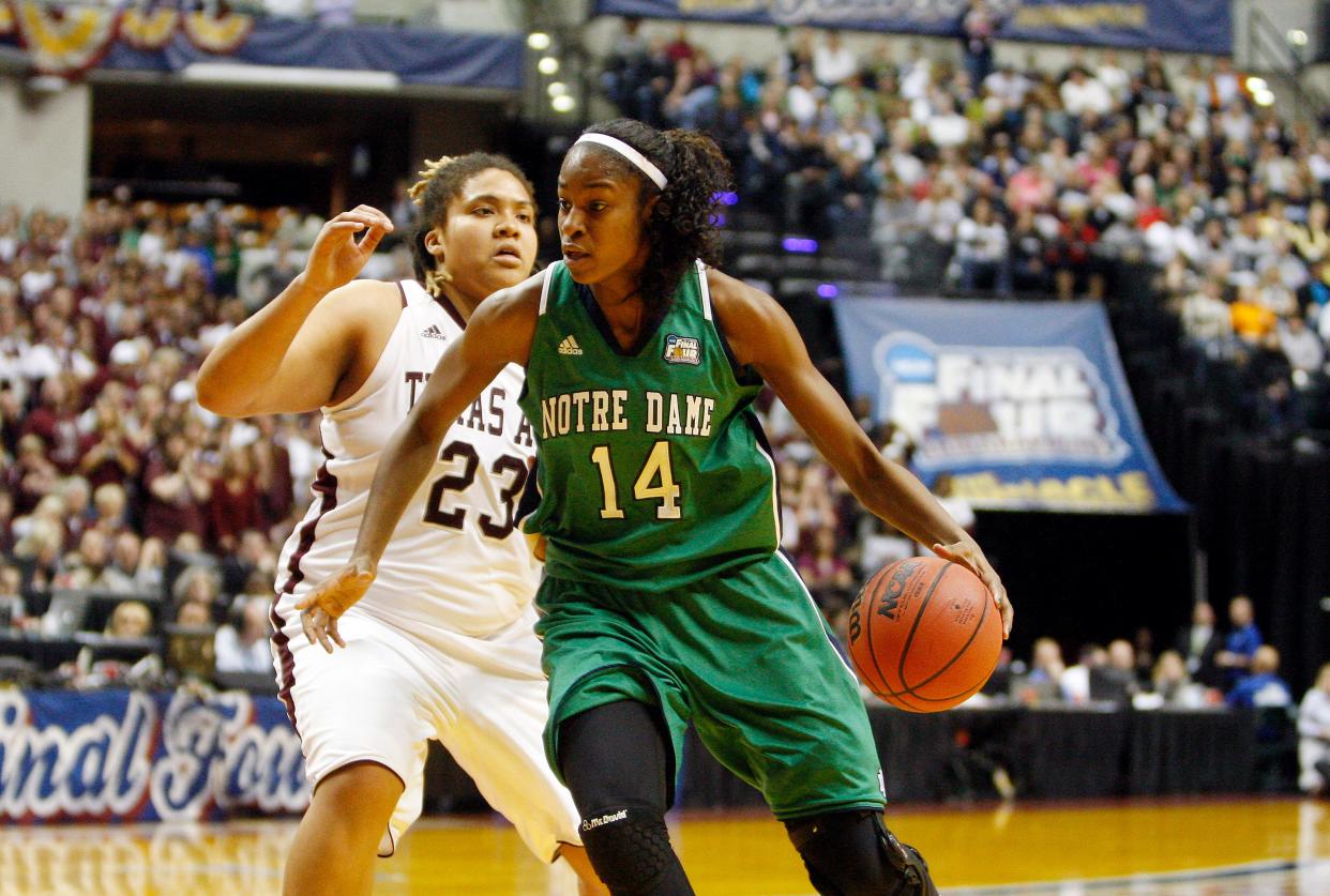 Notre Dame's Devereaux Peters drives past Texas A&M's Danielle Adams in the 2011 National Championship game. Notre Dame lost to Texas A&M 76-70. Peters would go on to be the third overall pick in the 2012 WNBA Draft, which at the time was the highest draft pick in school history.