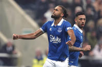 Everton's Dominic Calvert-Lewin celebrates after scoring their side's first goal during the English Premier League soccer match between Newcastle United and Everton at St. James' Park, in Newcastle, England, Tuesday, April 2, 2024. (Owen Humphreys/PA via AP)