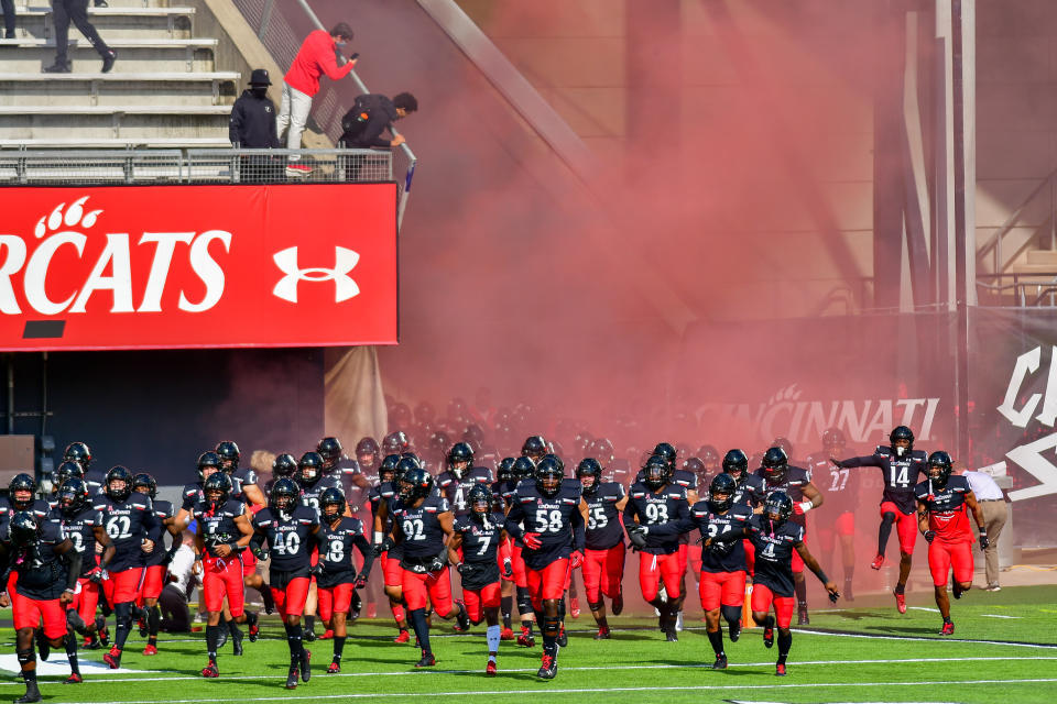 University of Cincinnati players take to the the field prior to the start of the NCAA college football game at Nippert Stadium between the University of Cincinnati Bearcats and the University of South Florida. Cincinnati defeated USF 28-7. Saturday, October 3rd, 2020, in Cincinnati, Ohio, United States. (Photo by Jason Whitman/NurPhoto via Getty Images)