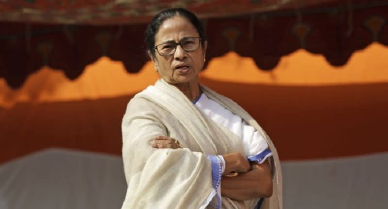 Mamata Banerjee, Chief Minister of West Bengal state talks as she staged a protest in public place in disagreement of recent raids by Central Bureau of Investigation (CBI)    in Kolkata, India, Monday, Feb. 4, 2019. Banerjee stayed overnight on street following the face off between Kolkata police and Central Bureau of Investigation officials on Sunday. (AP Photo/Bikas Das)