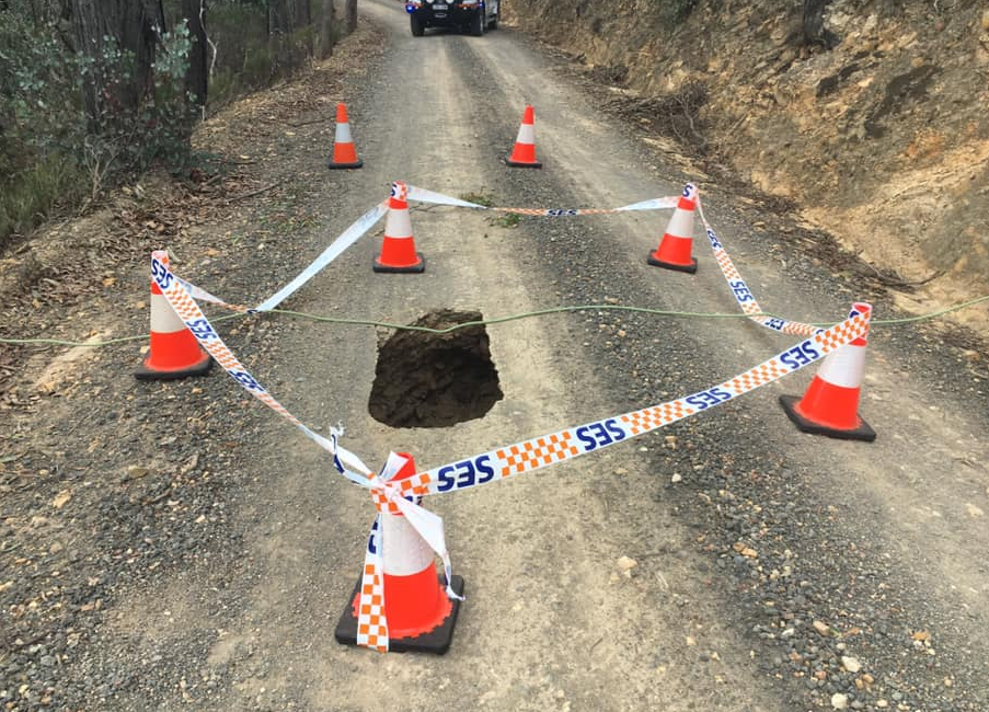 Cones and emergency tape was installed as a temporary barrier around the hole. Source: Facebook/<span>Gary Mackinnon</span>