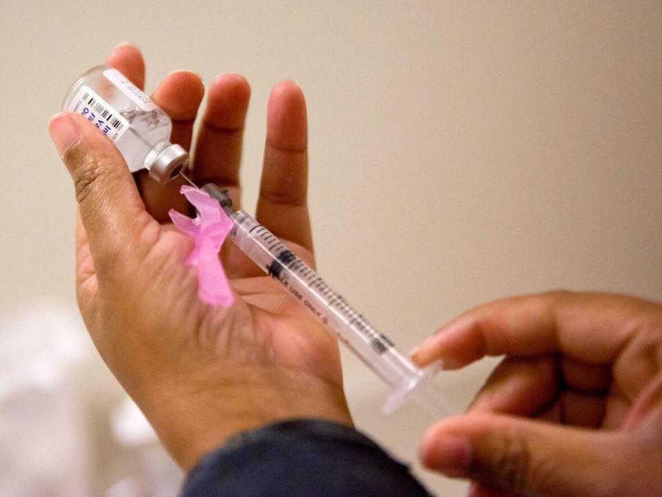 Starting Oct. 11, flu shots will be administered at public health clinics, local pharmacies and some physician and nurse practitioner offices. (David Goldman/Associated Press - image credit)