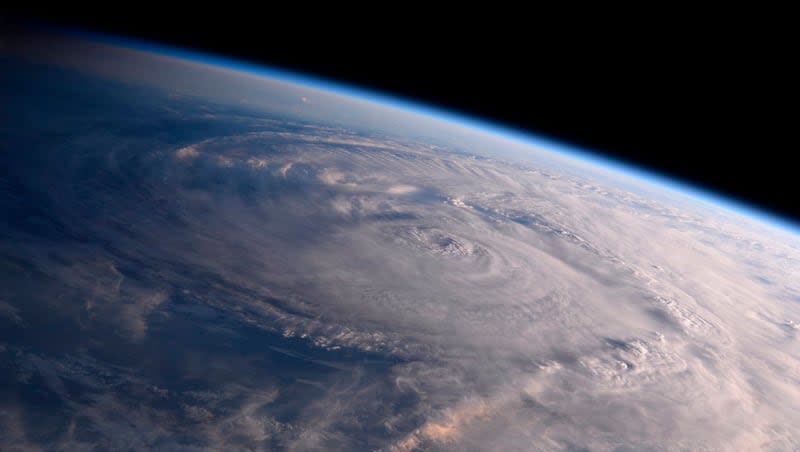 This Aug. 26, 2017, photo made available by NASA shows Hurricane Harvey over Texas as seen from the International Space Station. A new study found that the melting of polar ice caps is slowing down the Earth’s normal rotation.