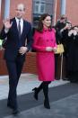 <p>Duckess Kate and Prince William paid a visit to Coventry, England. The Duchess wore a hot pink coat by Mulberry with a black clutch by the same brand with Tod's heels. </p>