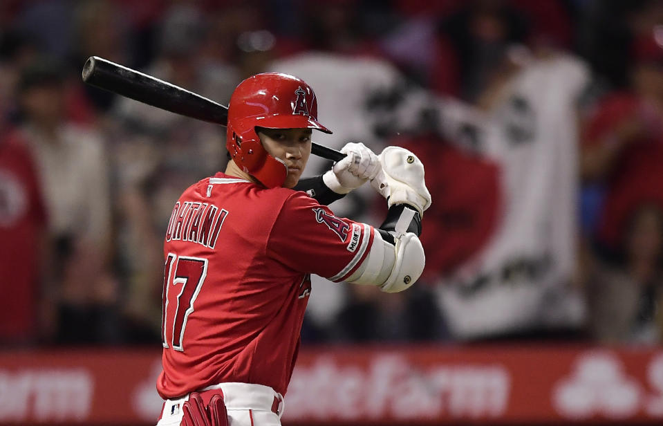 Los Angeles Angels' Shohei Ohtani, of Japan, warms up before batting in the fourth inning of the team's baseball game against the Seattle Mariners on Saturday, June 8, 2019, in Anaheim, Calif. (AP Photo/Mark J. Terrill)