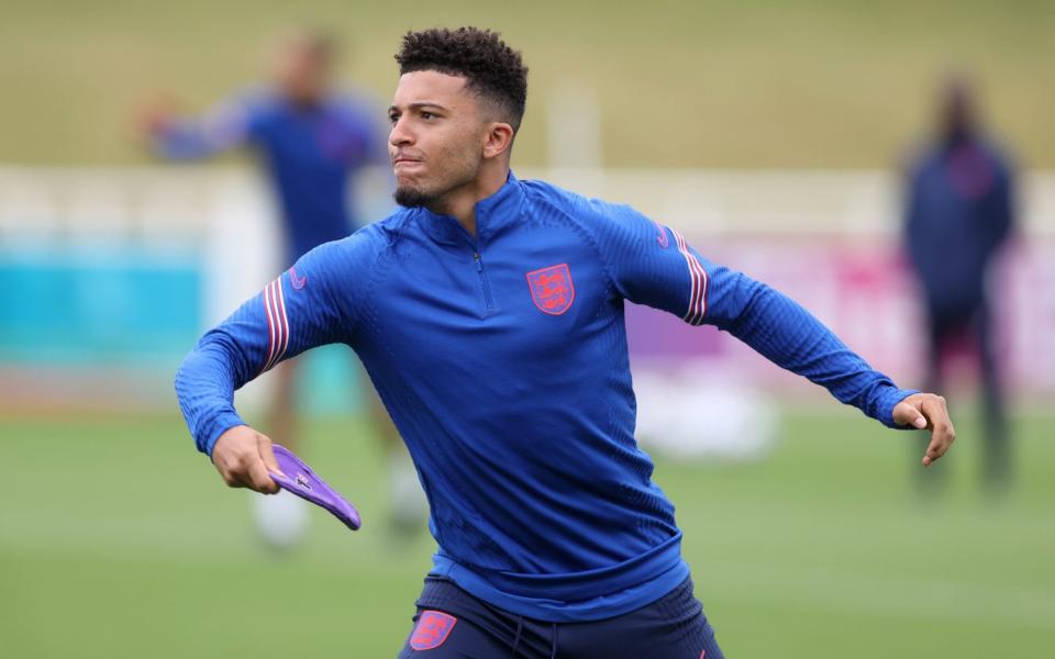 Sancho with a frisbee at England training - REUTERS