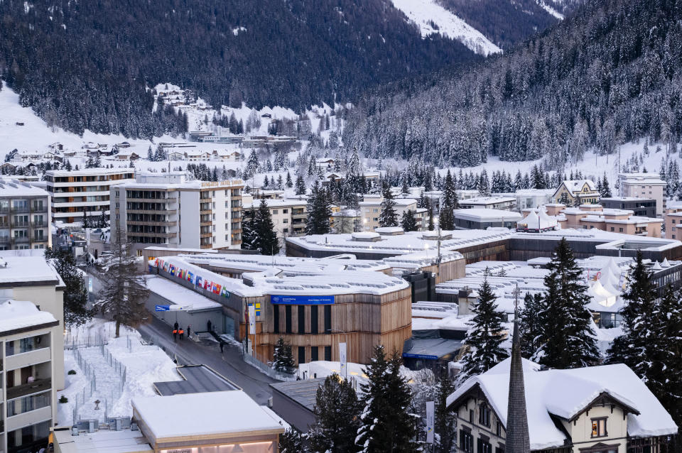 The Davos Congress Center, center, where the World Economic Forum will take place is covered in snow in Davos, Switzerland, Saturday, Jan. 13, 2024. The annual meeting of the World Economic Forum is taking place in Davos from Jan. 15 until Jan. 19, 2024. (AP Photo/Markus Schreiber)