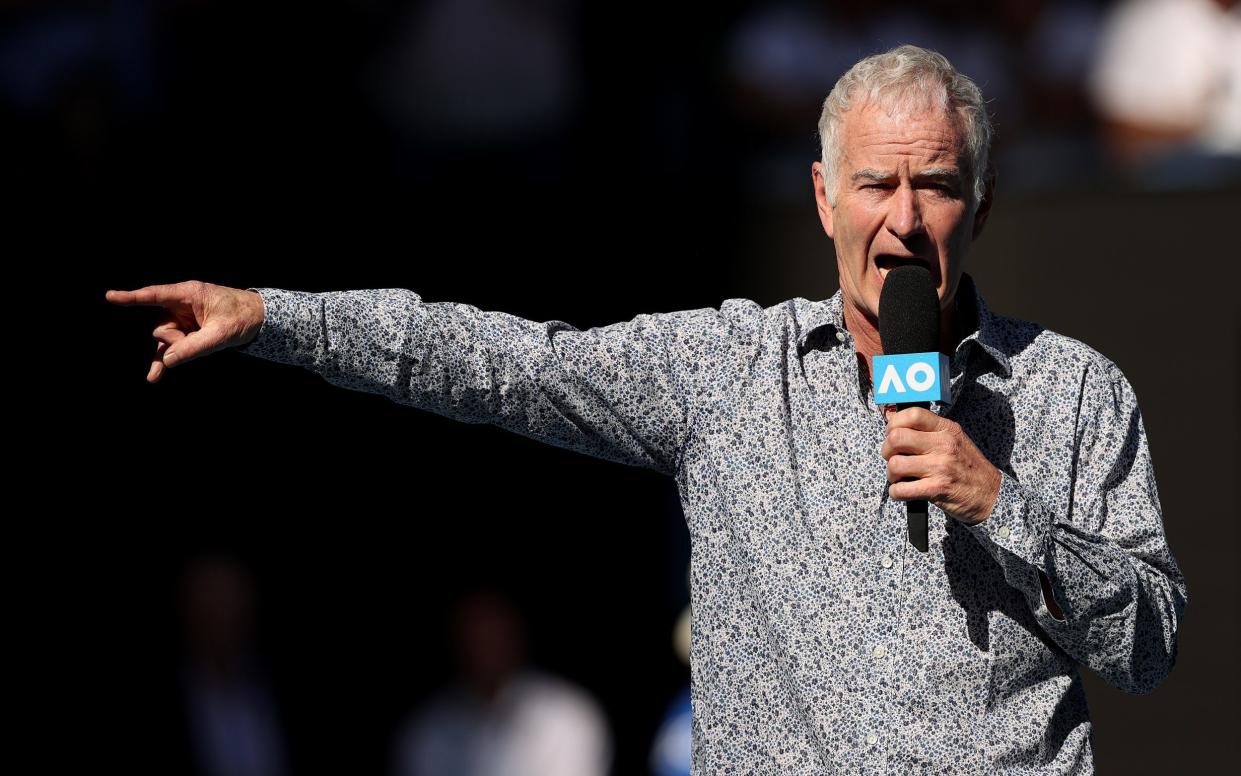 John McEnroe speaks on court after the Men's Singles third round match between Rafael Nadal of Spain and Pablo Carreno Busta of Spain - Getty Images