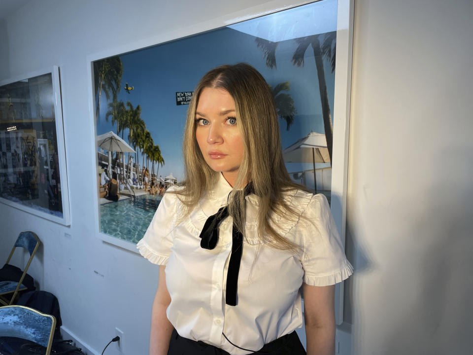 Anna Delvey, also known as Anna Sorokin, poses at her apartment in New York on May 26, 2023, to promote her podcast, “The Anna Delvey Show.” (AP Photo/John Carucci)