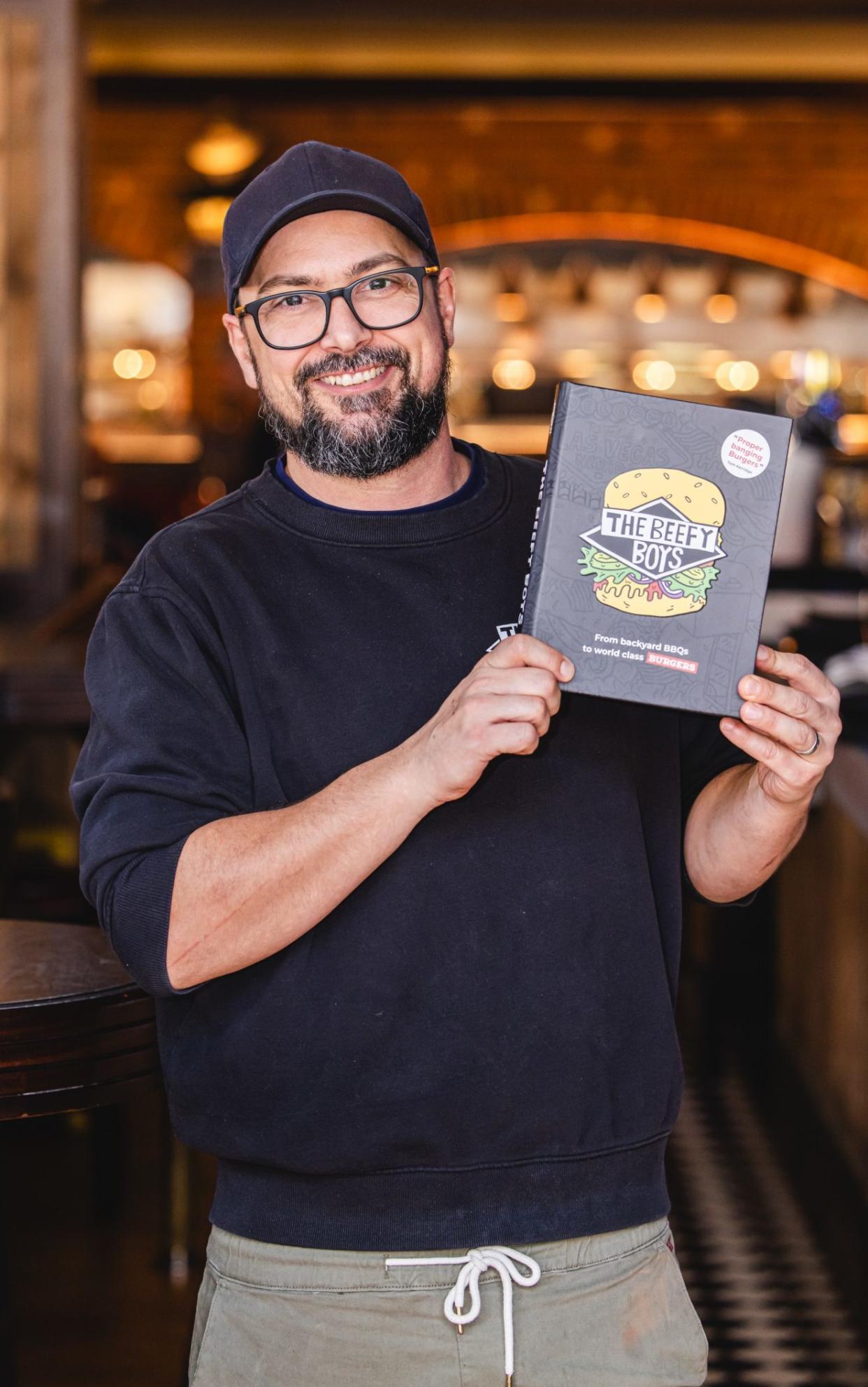 Award-winning burger-maker Anthony "Murf" Murphy shows off his new cookbook