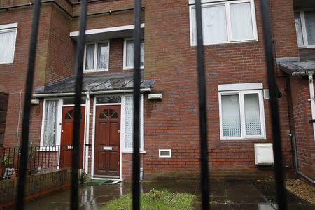 A flat is seen through railings in west London February 26, 2015. Local media reported that the flat is the former home of Mohammed Emwazi. REUTERS/Stefan Wermuth