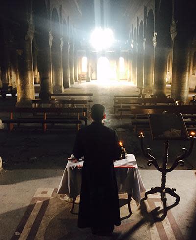 A Mosul priest preparing for a service. Most Christians fled Mosul after the arrival of Islamic State in June 2014