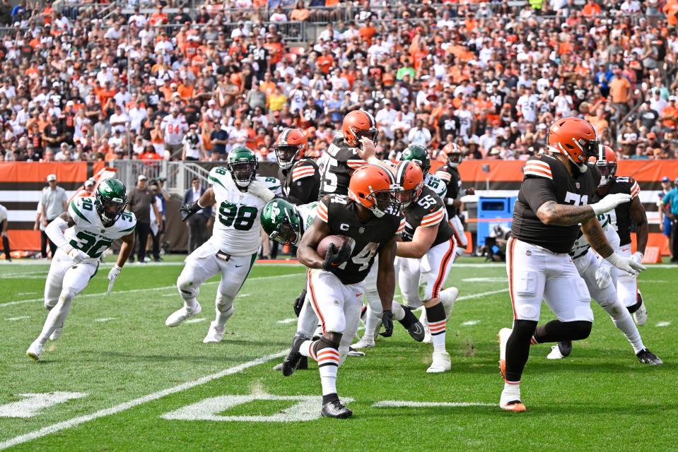 Browns running back Nick Chubb follows a block on his way to a touchdown against the New York Jets during the second half, Sunday, Sept. 18, 2022, in Cleveland.