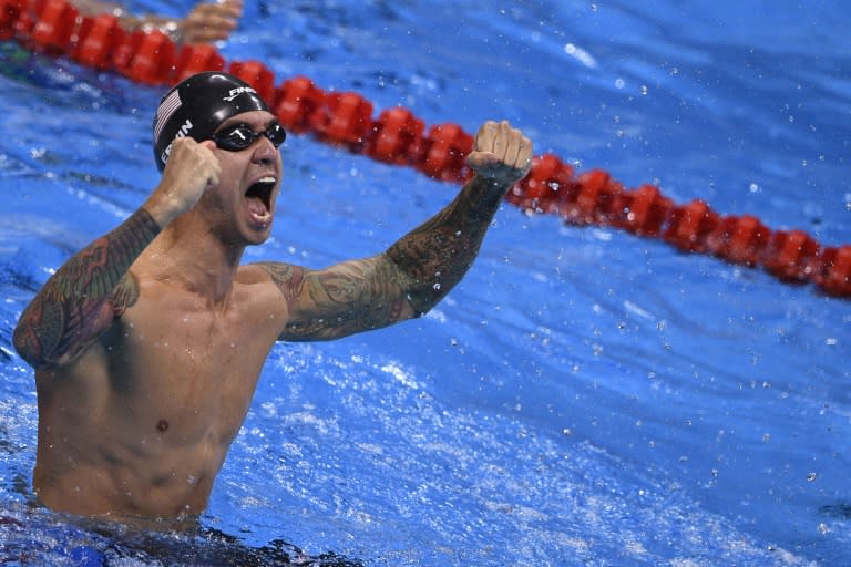 USA's Anthony Ervin celebrates after winning 50m freestyle final at the Rio 2016 Olympic Games, on August 12