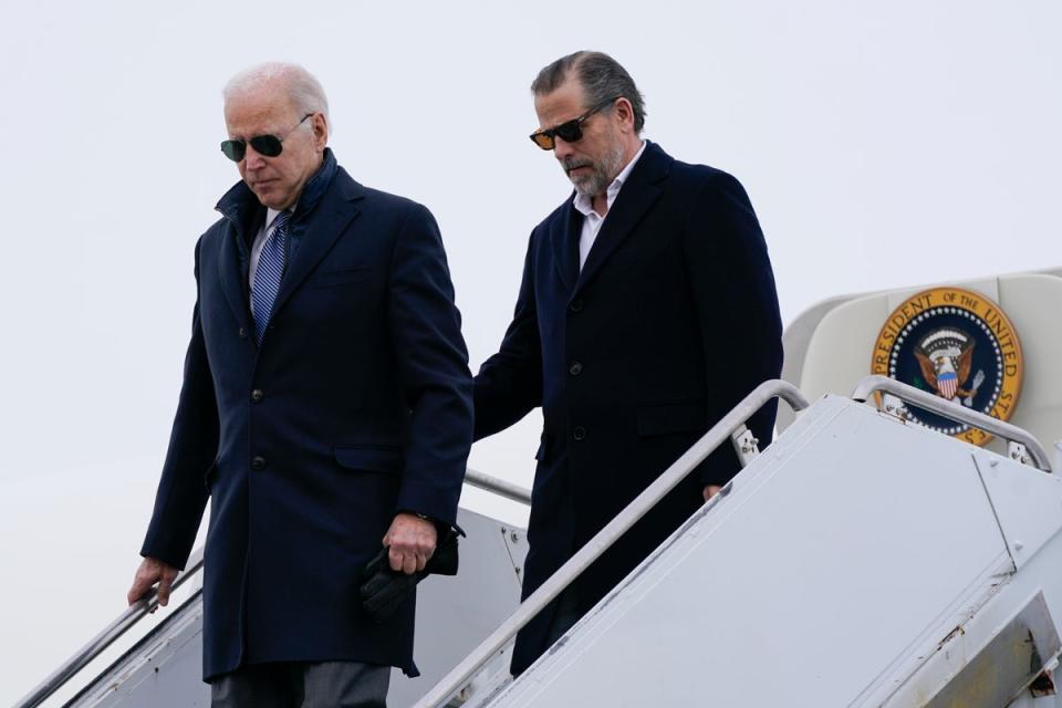 President Joe Biden and his son, Hunter Biden, step off Air Force One (AP)