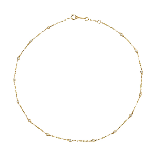 the last line gold bezel necklace against white background