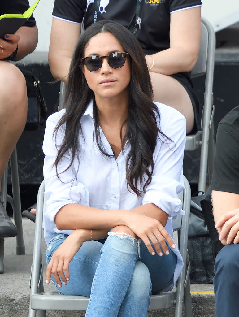 Markle first officially appeared with Prince Harry at the Invictus Games, rocking natural nails and a casual look. (Photo: Getty Images)