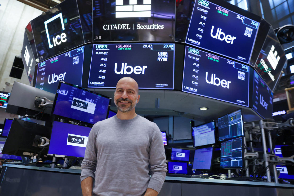 Uber CEO Dara Khosrowshahi poses on the trading floor at the New York Stock Exchange (NYSE) in Manhattan, New York City, U.S., August 2, 2022. REUTERS/Andrew Kelly