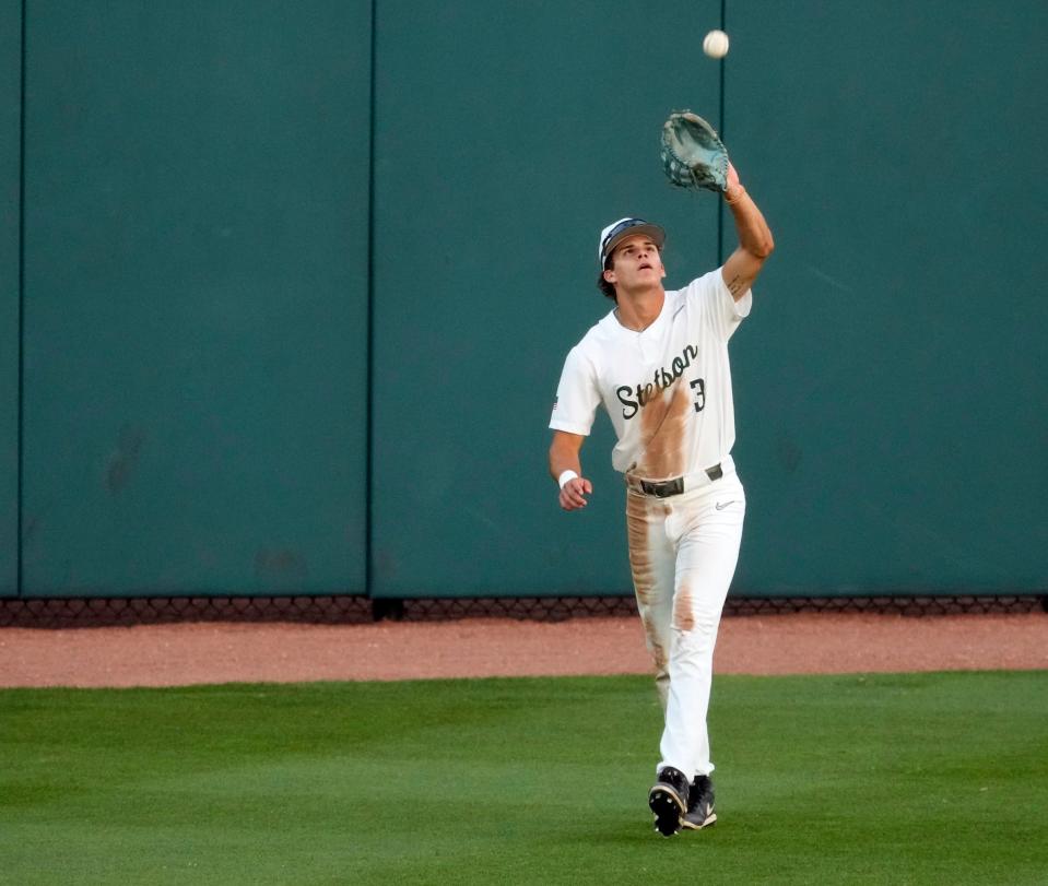 Stetson outfielder Kyle Jones makes the catch during a game with UCF at Melching Field at Conrad Park in DeLand, Wednesday, April 10, 2024.