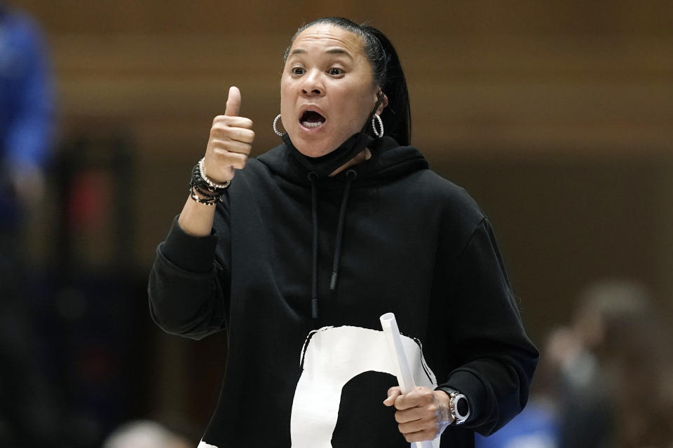 South Carolina head coach Dawn Staley directs her players during the first half of an NCAA college basketball game against Duke in Durham, N.C., Wednesday, Dec. 15, 2021. (AP Photo/Gerry Broome)