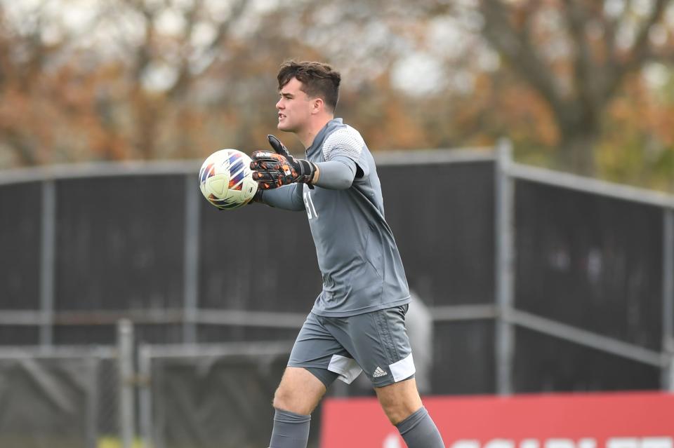 Rutgers goalkeeper Ciaran Dalton directs the defense after making a save in the Big Ten Tournament final