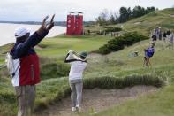 Team Europe's Tyrrell Hatton hits from a bunker on the fourth hole during a practice day at the Ryder Cup at the Whistling Straits Golf Course Wednesday, Sept. 22, 2021, in Sheboygan, Wis. (AP Photo/Ashley Landis)