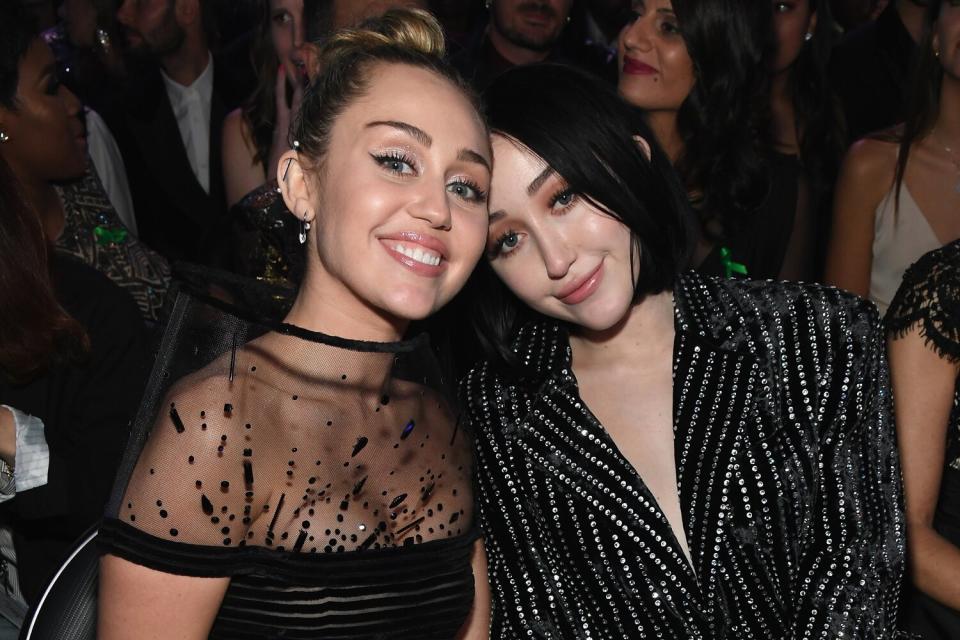 Miley Cyrus (L) and Noah Cyrus pose during the 61st Annual GRAMMY Awards at Staples Center on February 10, 2019 in Los Angeles, California.