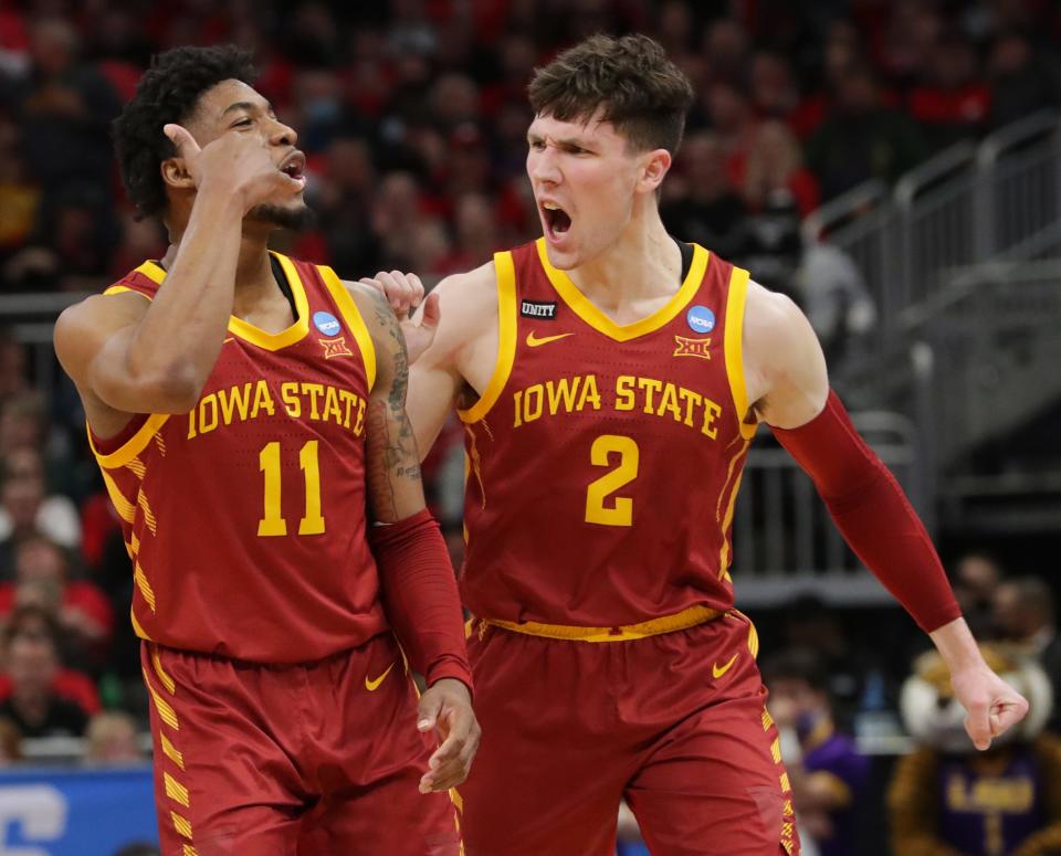 Iowa State guard Tyrese Hunter (11) and guard Caleb Grill (2) celebrate a basket during the second half in the first round game of the 2022 NCAA Men's Basketball Tournament Friday, March 18, 2022 at Fiserv Forum in Milwaukee, Wis. Iowa State beat LSU 59-54.