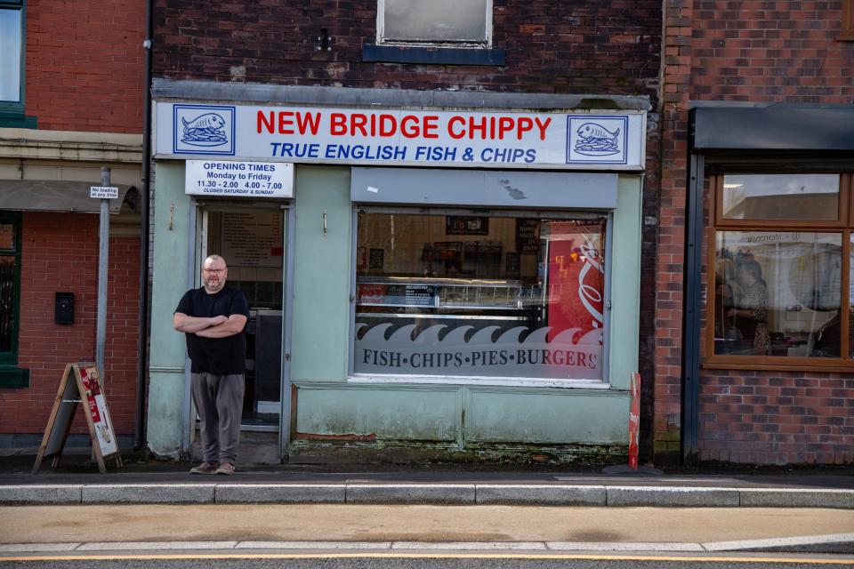 Mark Fowler, 46, owner of New Bridge Chippy along Castleton Highstreet. (SWNS)