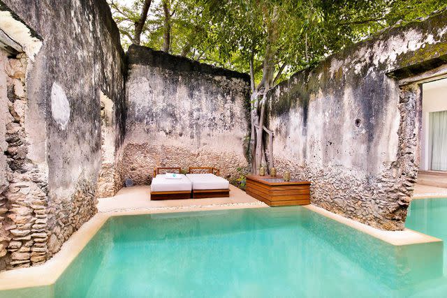 <p>Courtesy of Chablé Hotelst</p> A cozy spot for couples at Chablé Yucatán.