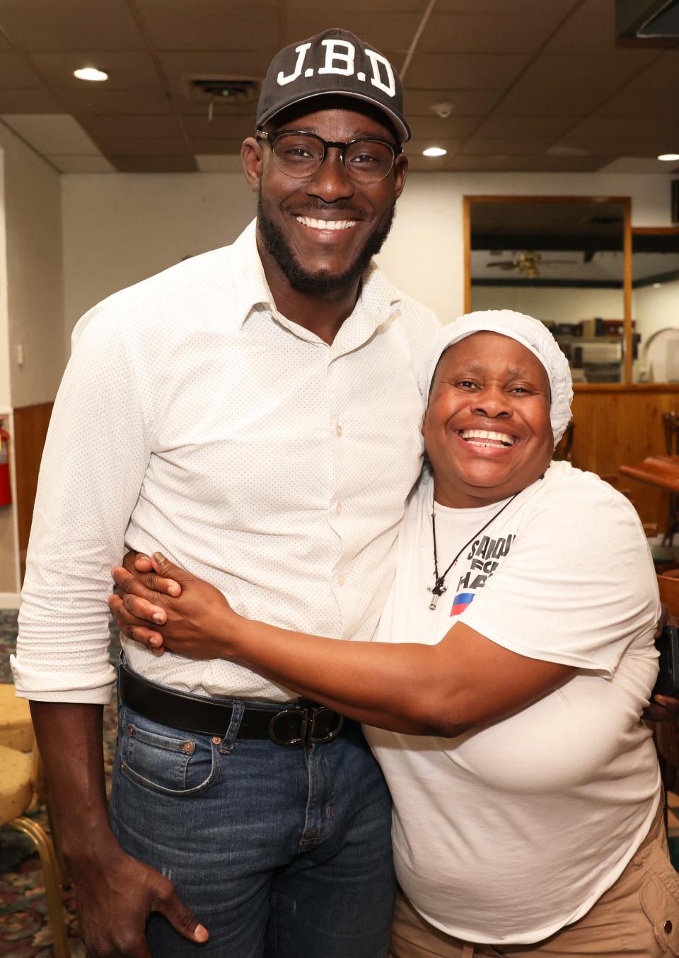 Jean Bradley Derenoncourt Councilor-At-Large top the ticket with votes and is congratulated by Marie Bouquet on Tuesday, Sept. 19, 2023.