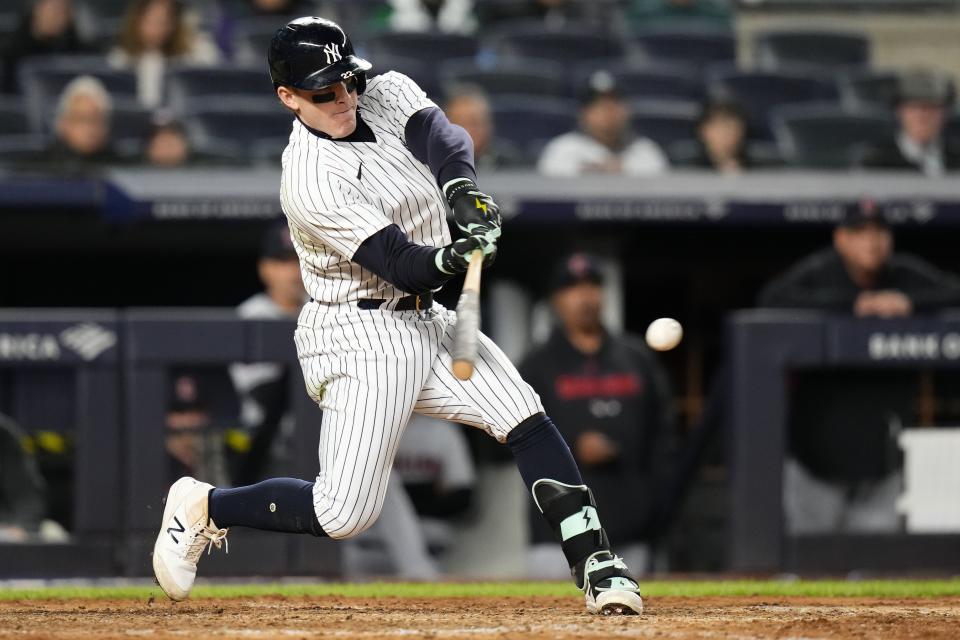 New York Yankees' Harrison Bader hits a single during the eighth inning of a baseball game against the Cleveland Guardians Tuesday, May 2, 2023, in New York. The Yankees won 4-2. (AP Photo/Frank Franklin II)