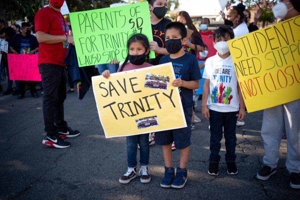Parents, teachers and students rallied outside a Los Angeles district office in 2021 to keep Trinity Elementary open. The Los Angeles district has 125 schools where enrollment declined at least 20% between 2019 and 2021, according to Brookings Institution researchers. (David Crane/MediaNews Group/Los Angeles Daily News via Getty Images)