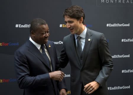 Canada's Prime Minister Justin Trudeau welcomes Togo's President Faure Essozimna Gnassingbe to the Fifth Replenishment Conference of the Global Fund to Fight AIDS, Tuberculosis, and Malaria in Montreal, Quebec, Canada September 17, 2016. REUTERS/Christinne Muschi