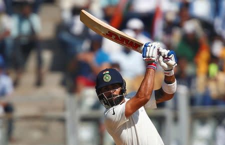 Cricket - India v England - Fourth Test cricket match - Wankhede Stadium, Mumbai, India - 11/12/16. India's Virat Kohli plays a shot. REUTERS/Danish Siddiqui