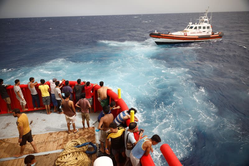 FILE PHOTO: Migrant onboard the NGO Proactiva Open Arms Uno rescue boat