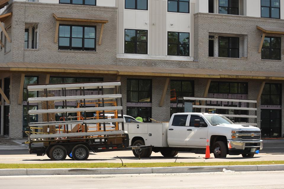 Construction continues at The Range off Oleander Drive on Wednesday, March 13, 2024. It's one of a few apartment complexes being built across the Wilmington area.