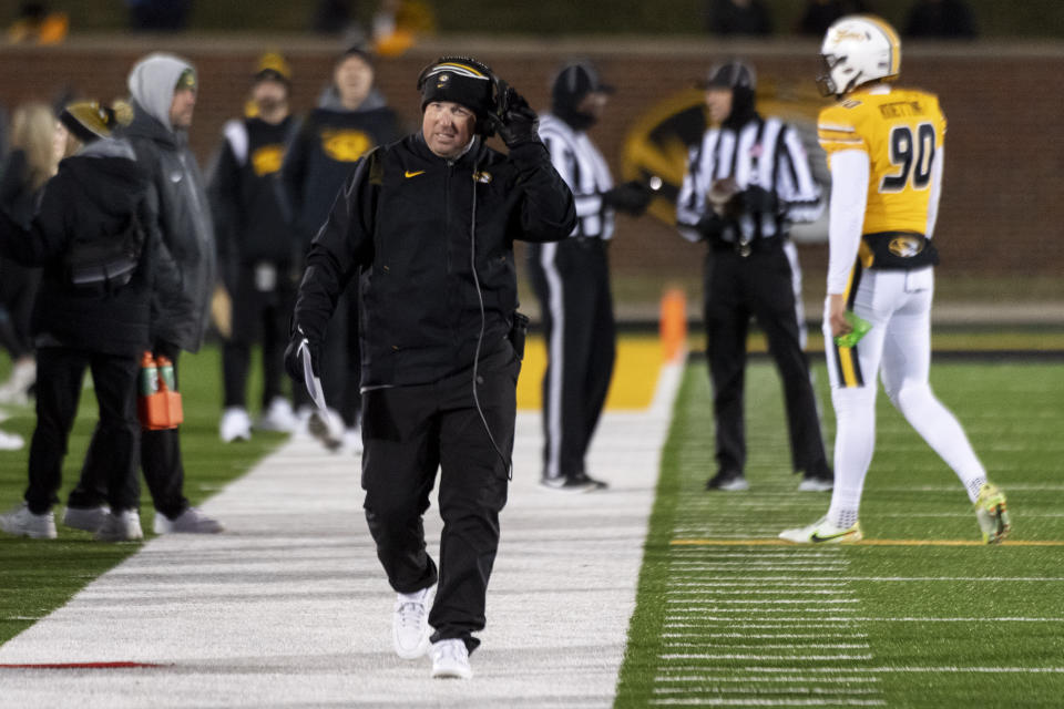 Missouri coach Eliah Drinkwitz walks the sideline during the first quarter of the team's NCAA college football game against New Mexico State on Saturday, Nov. 19, 2022, in Columbia, Mo. (AP Photo/L.G. Patterson)