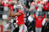 Ohio State receiver Chris Olave catches a touchdown pass during the first half of an NCAA college football game against Michigan State, Saturday, Nov. 20, 2021, in Columbus, Ohio. (AP Photo/Jay LaPrete)