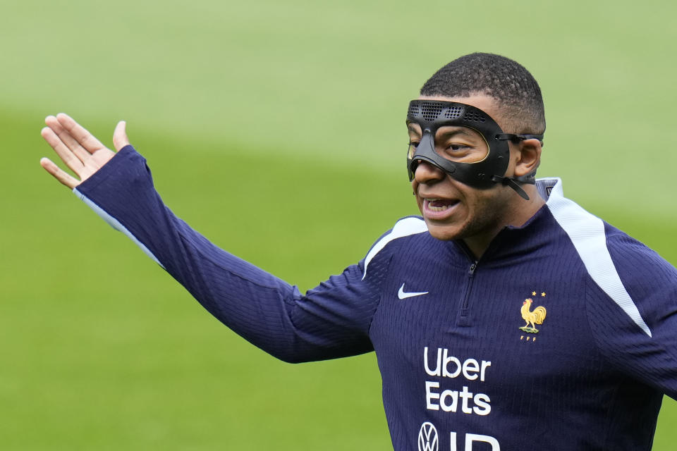 France's Kylian Mbappe gestures during a training session in Paderborn, Germany, Sunday, June 23, 2024. France will play against Poland during their Group D soccer match at the Euro 2024 soccer tournament on June 25. (AP Photo/Hassan Ammar)