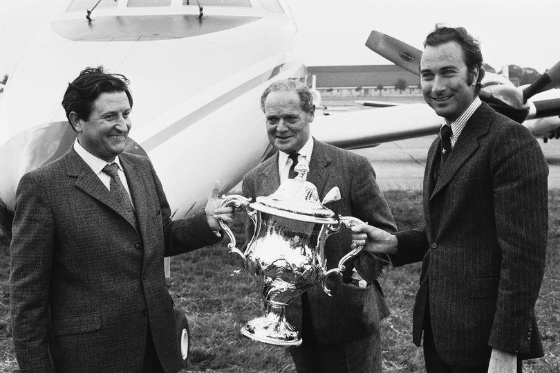 Prince William of Gloucester presents the Daily Express Air Race trophy to winner Captain Bill Bright